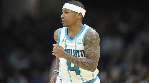 Isaiah Thomas jogs down the court.